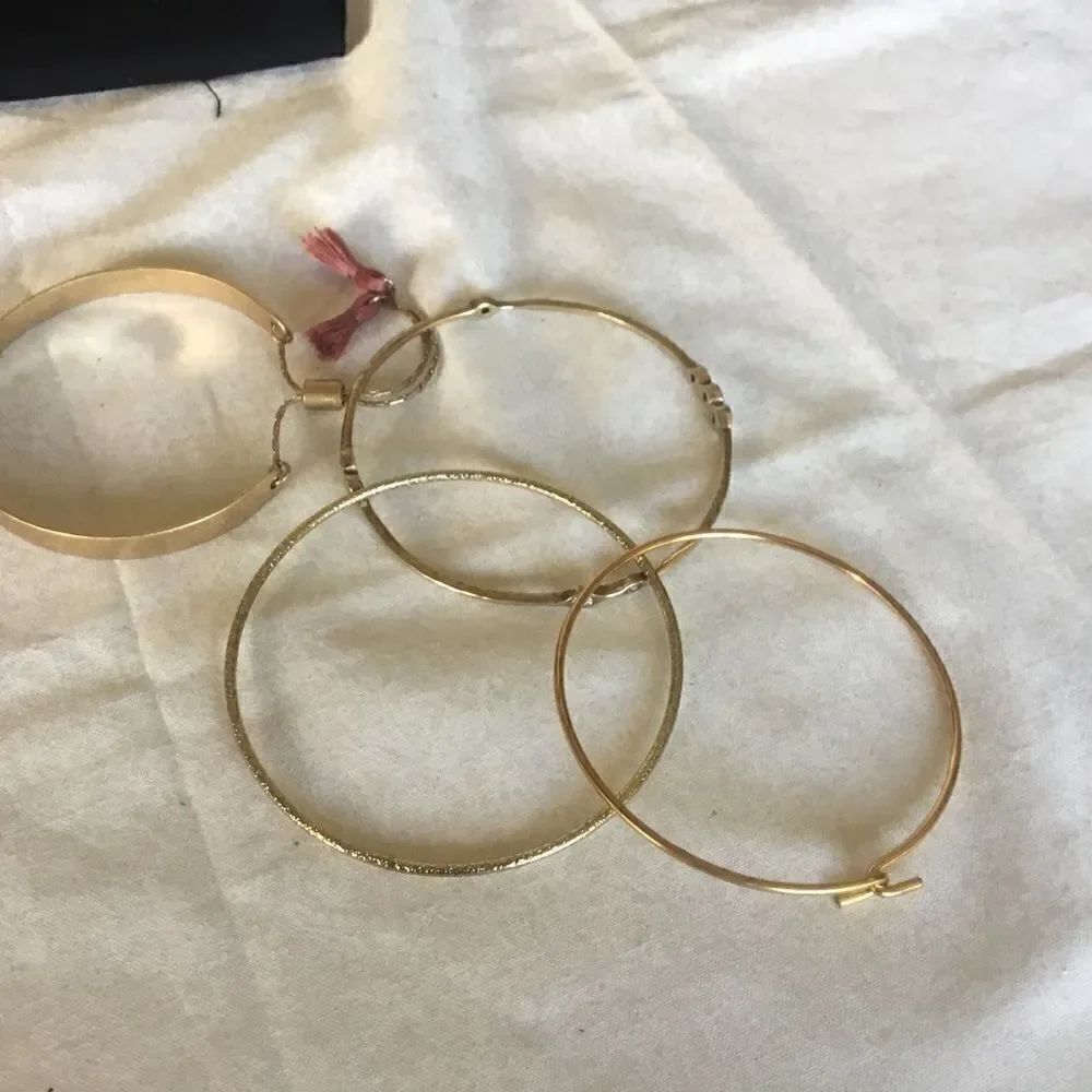 $8 ea or 3/$15. Four Goldtone Bangle Beauties